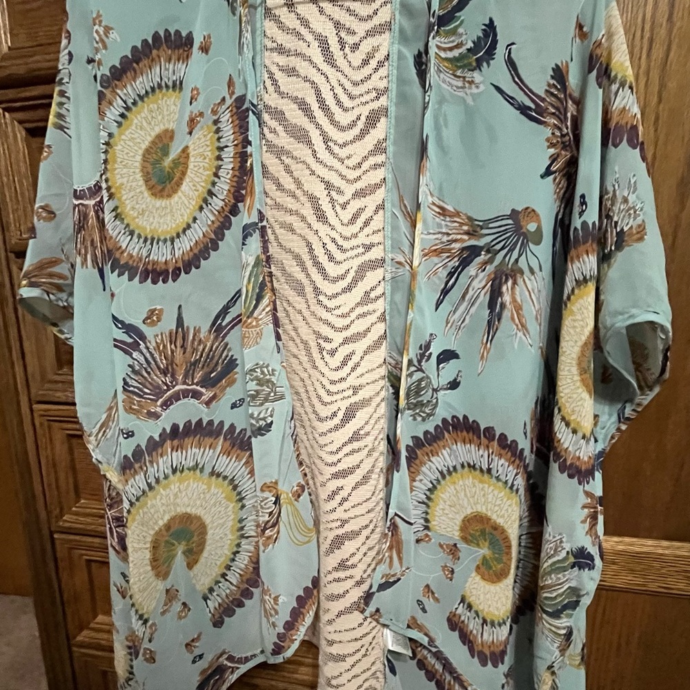 UMGEE cardigan, size small/medium, with lace in the medium of the back